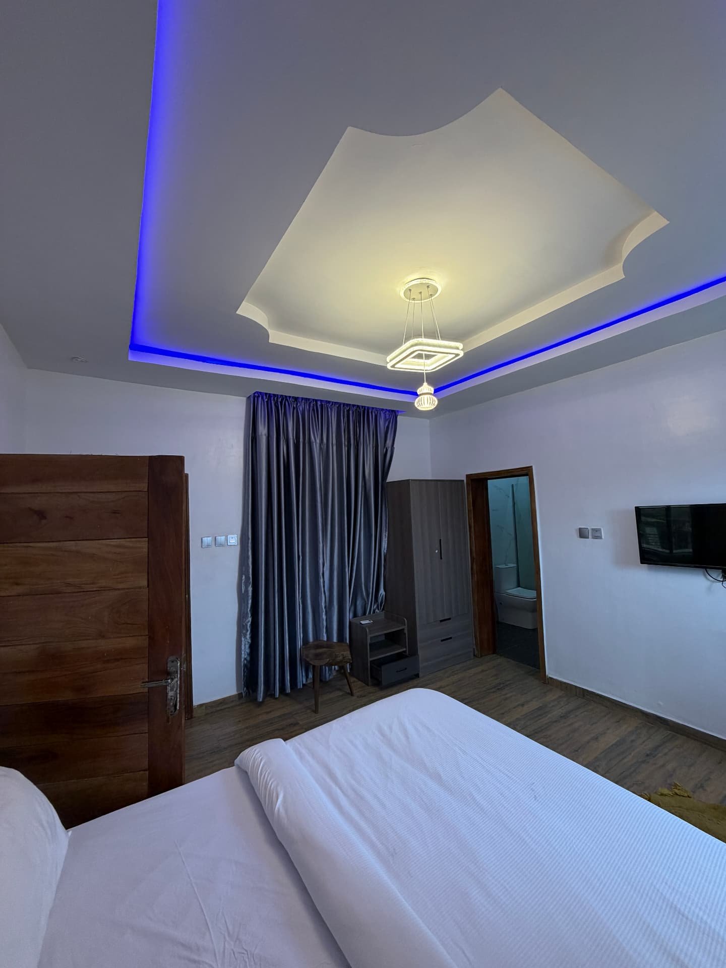 King bed in the first bedroom of the 2 Bed with Indoor Swimming Pool